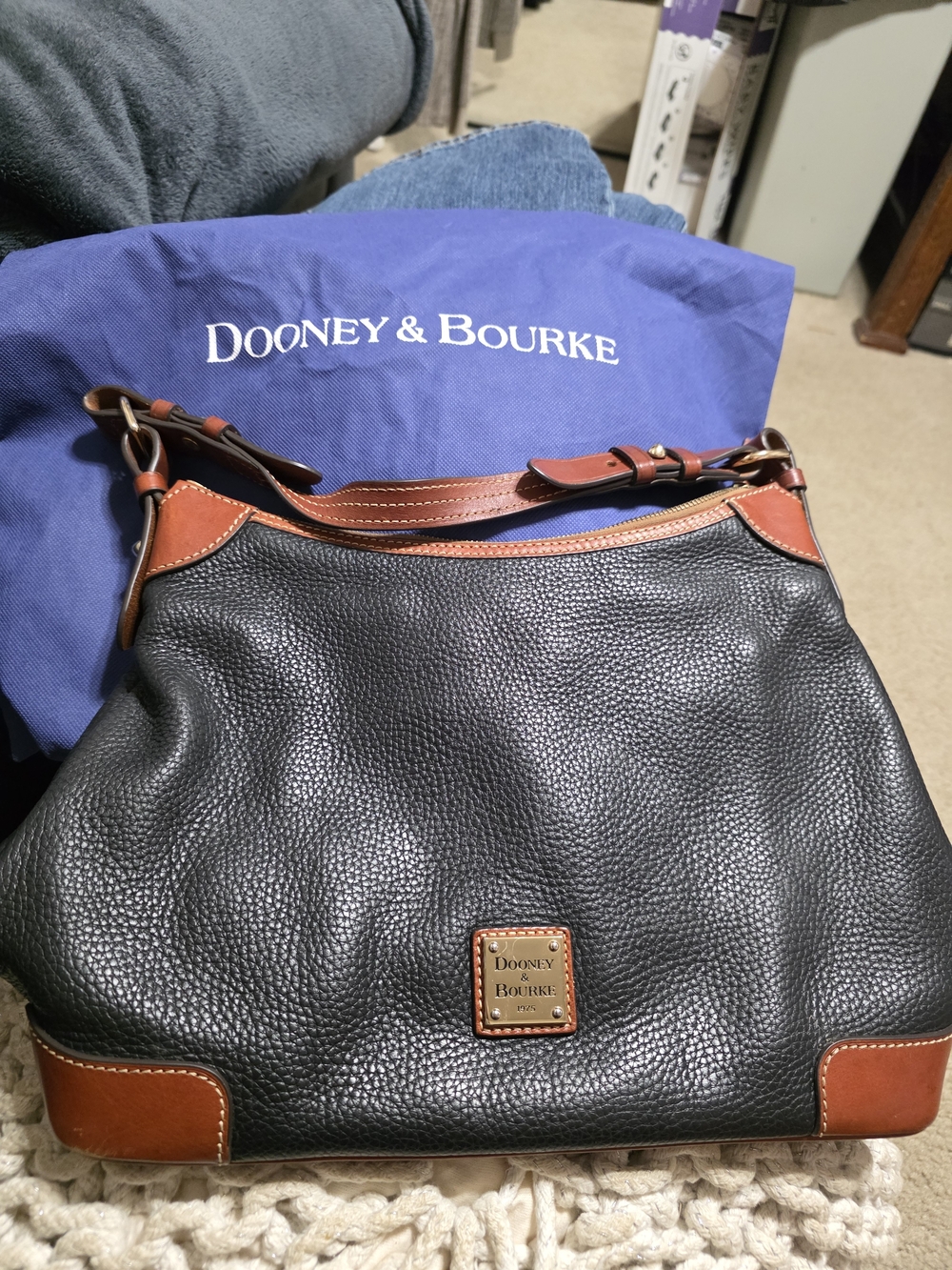 Dooney & Bourke Black Pebbled Leather Messenger with Brown Trim